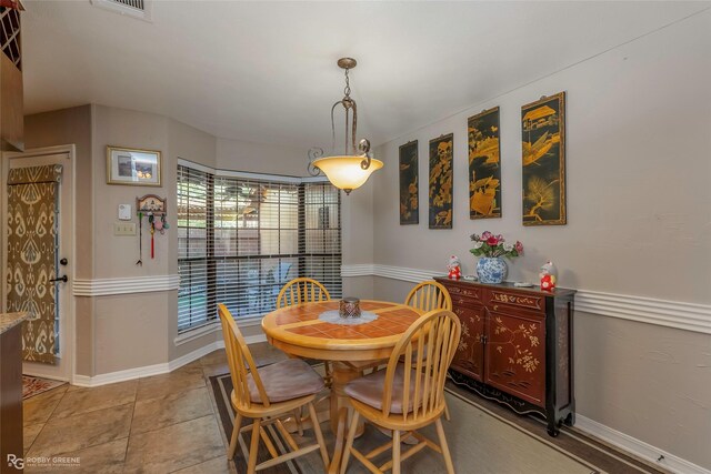 bedroom featuring carpet floors, baseboards, and ceiling fan