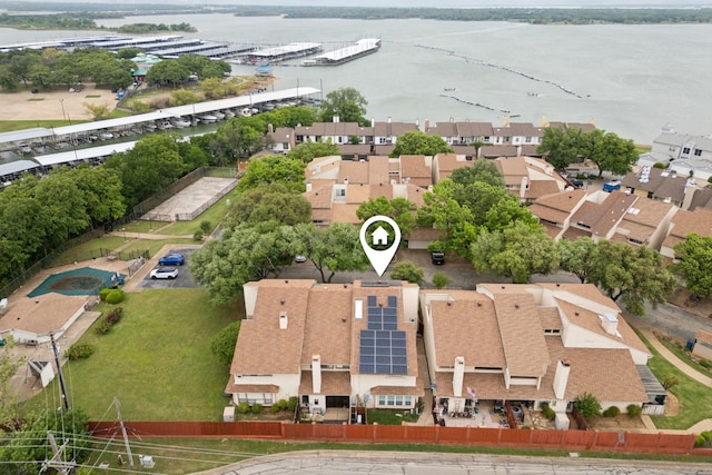 bird's eye view with a residential view and a water view
