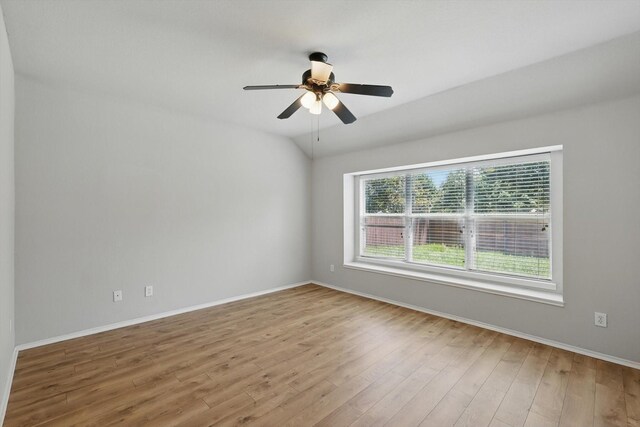 909 Whisper Ln, Mckinney, TX 75072 - spare room featuring wood finished floors and a ceiling fan