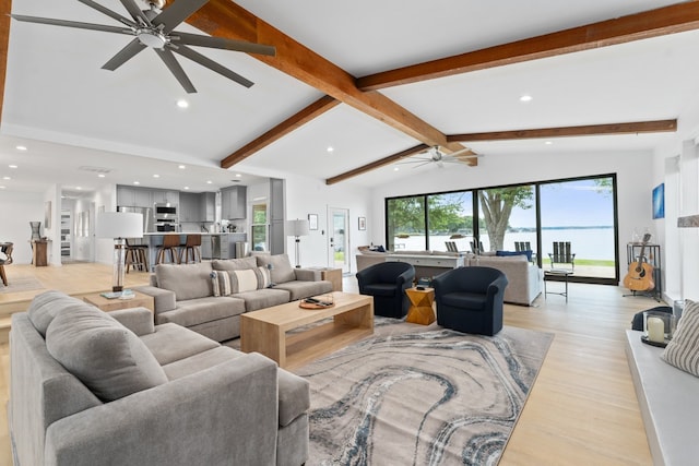 living room with recessed lighting, vaulted ceiling with beams, a ceiling fan, and light wood finished floors