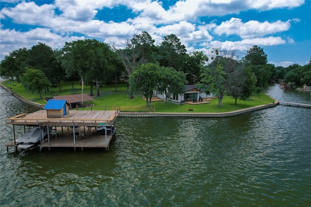 221 Edythe Dee Ln, Mabank, TX 75156 - dock area featuring a water view, boat lift, and a lawn