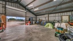 2380 County Road 422, Huckabay, TX 76401 - garage featuring metal wall