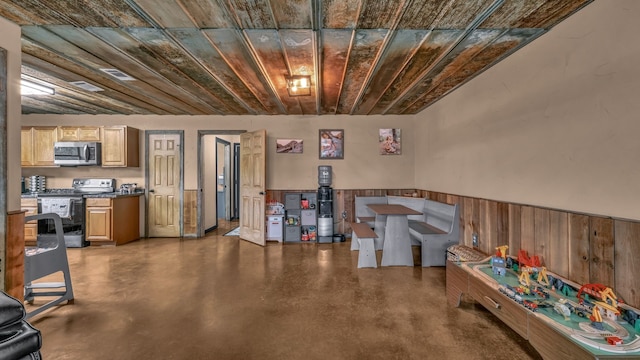 2380 County Road 422, Huckabay, TX 76401 - below grade area with wood walls, wood ceiling, and a wainscoted wall