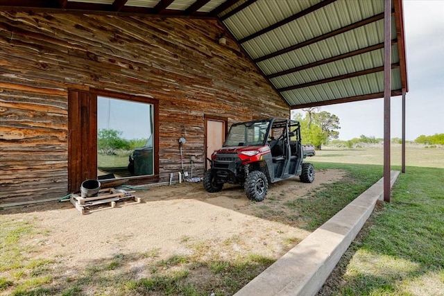 view of parking / parking lot featuring a carport