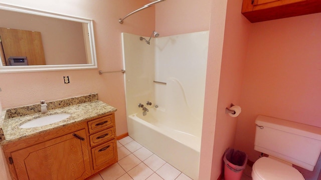 bathroom with tile patterned flooring, toilet, vanity, and bathing tub / shower combination