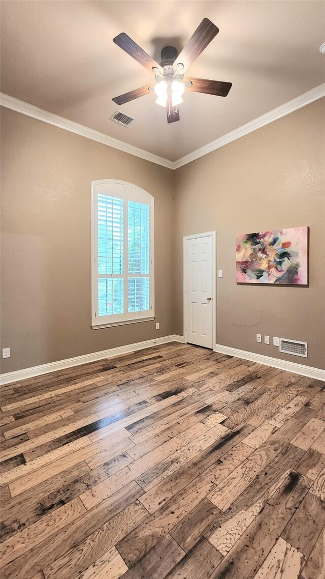 4406 Bay Valley Dr, Garland, TX 75043 - unfurnished room featuring hardwood / wood-style flooring, visible vents, and ornamental molding