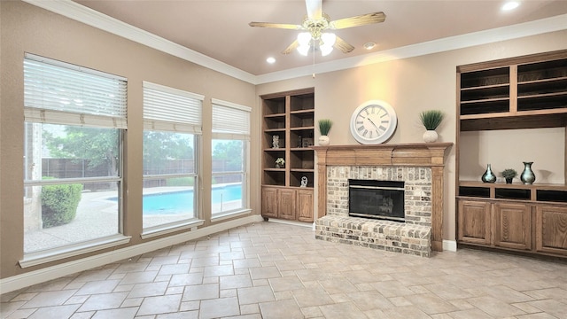 4406 Bay Valley Dr, Garland, TX 75043 - unfurnished living room featuring stone finish floor, a ceiling fan, ornamental molding, a fireplace, and built in shelves