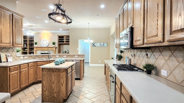 4406 Bay Valley Dr, Garland, TX 75043 - kitchen featuring a sink, decorative backsplash, stainless steel appliances, a peninsula, and recessed lighting