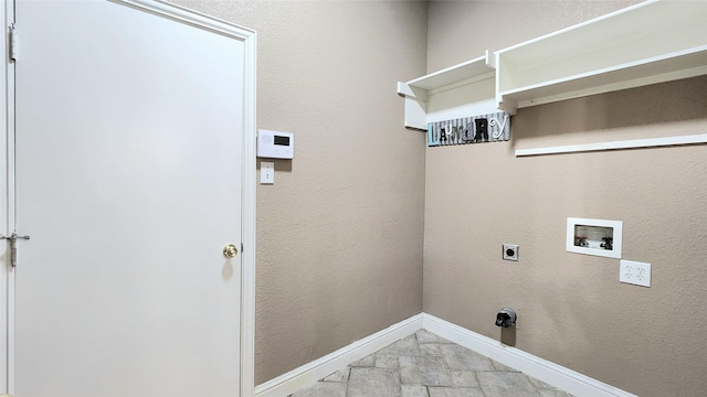 4406 Bay Valley Dr, Garland, TX 75043 - clothes washing area featuring electric dryer hookup, baseboards, stone finish floor, laundry area, and washer hookup