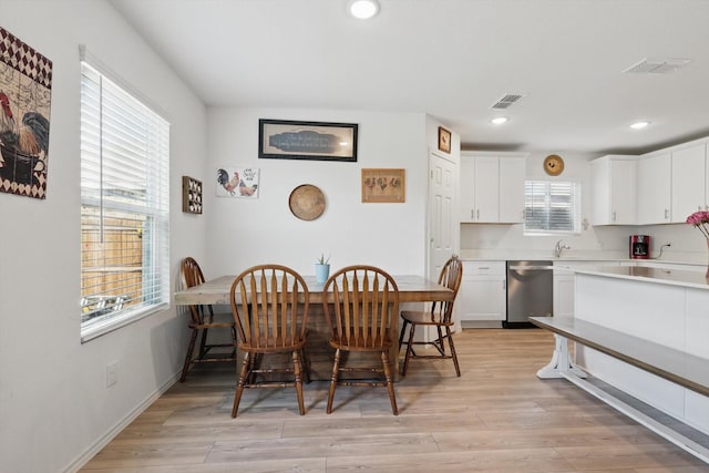 1020 Valerian Dr, Haslet, TX 76052 - dining room featuring recessed lighting, light wood-style flooring, and baseboards