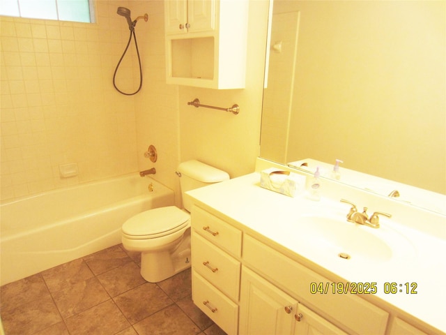 bathroom with toilet, vanity, tile patterned floors, and bathing tub / shower combination