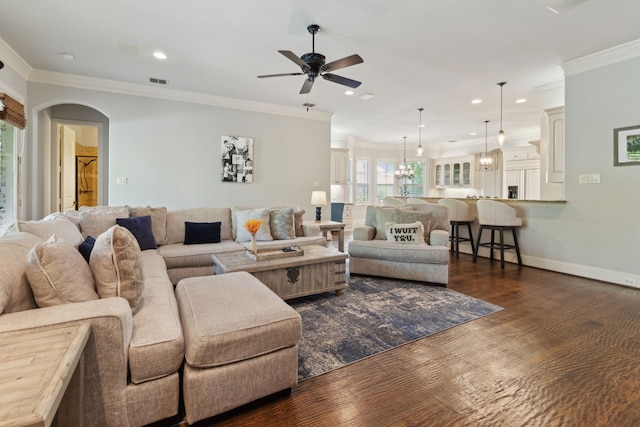 1191 Broken Bend Dr, Prosper, TX 75078 - living area with a ceiling fan, ornamental molding, dark wood-style floors, recessed lighting, and arched walkways