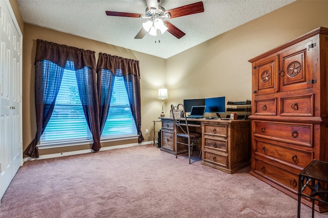 3451 Sudith Ln, Midlothian, TX 76065 - home office featuring a ceiling fan, light colored carpet, a textured ceiling, and baseboards