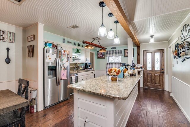 4158 Fm 6, Caddo Mills, TX 75135 - kitchen featuring stainless steel fridge with ice dispenser, dark wood-style flooring, ornamental molding, dishwashing machine, and light stone counters