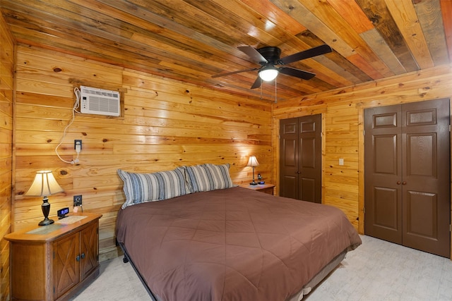 bedroom with wooden ceiling, wood walls, an AC wall unit, and ceiling fan