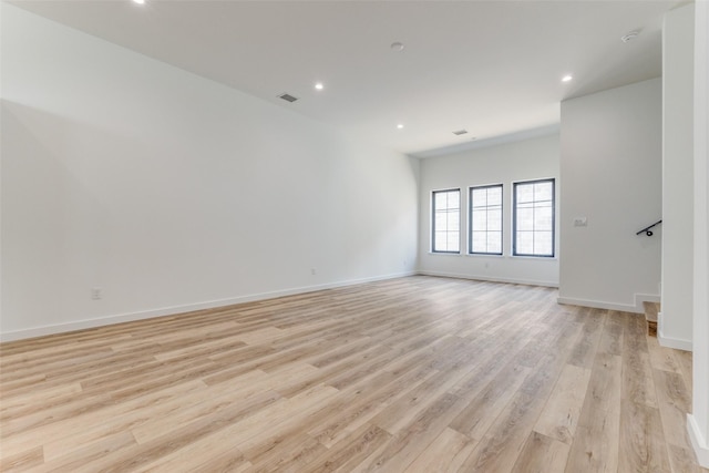 1775 Novela Way, Dallas, TX 75215 - spare room with light wood-type flooring, recessed lighting, and baseboards