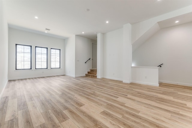 1775 Novela Way, Dallas, TX 75215 - empty room with recessed lighting, light wood-style flooring, stairs, and baseboards