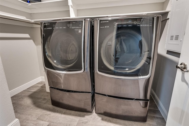 736 Wilmott Ter, Fort Worth, TX 76247 - laundry area featuring washing machine and clothes dryer, electric panel, and baseboards