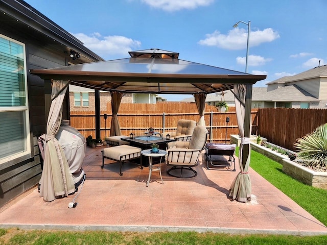 736 Wilmott Ter, Fort Worth, TX 76247 - fenced backyard featuring a gazebo, a patio area, and an outdoor hangout area