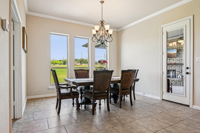 dining space featuring baseboards, an inviting chandelier, ornamental molding, and light tile patterned flooring