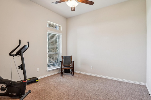 exercise area featuring a wealth of natural light, baseboards, carpet floors, and ceiling fan