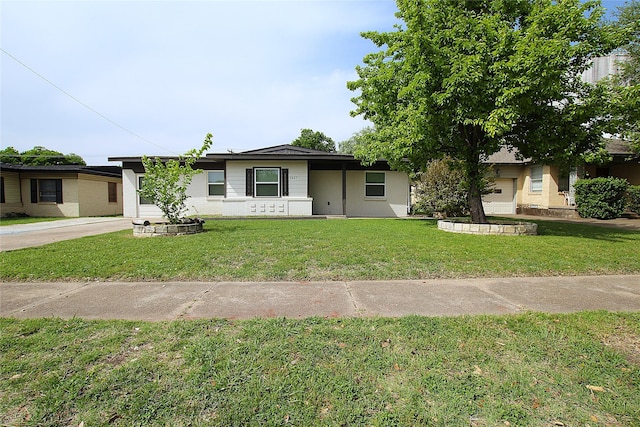 2427 Costa Mesa Dr, Dallas, TX 75228 - view of front of home with driveway and a front yard