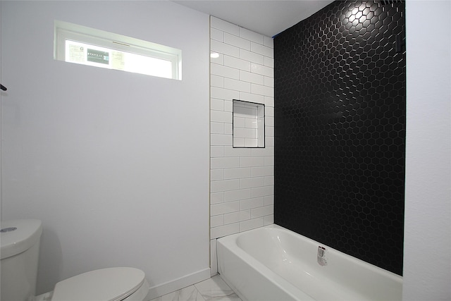 2427 Costa Mesa Dr, Dallas, TX 75228 - full bathroom with marble finish floor, toilet, shower / bathtub combination, and baseboards