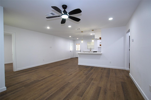 2427 Costa Mesa Dr, Dallas, TX 75228 - unfurnished living room with a ceiling fan, baseboards, dark wood-style flooring, visible vents, and recessed lighting