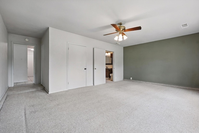 112 Bow Creek Cir, Red Oak, TX 75154 - unfurnished bedroom featuring carpet flooring, baseboards, a ceiling fan, and connected bathroom