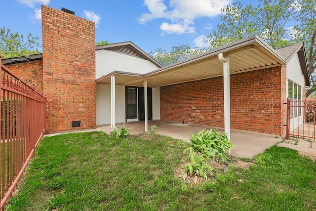 112 Bow Creek Cir, Red Oak, TX 75154 - back of property with a patio, brick siding, and a chimney