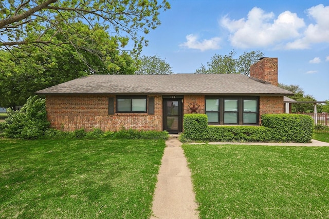 112 Bow Creek Cir, Red Oak, TX 75154 - ranch-style home with brick siding, a front lawn, a chimney, and a shingled roof