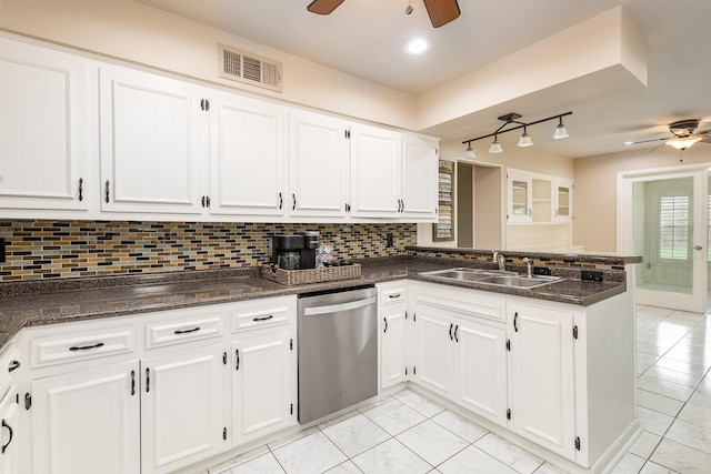 kitchen featuring visible vents, a ceiling fan, stainless steel dishwasher, and a sink