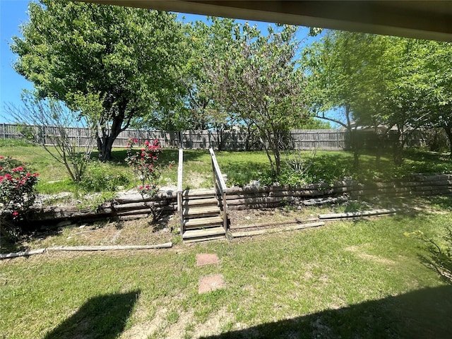 view of yard featuring fence