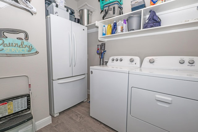4125 Stockman Dr, Krum, TX 76249 - laundry room featuring independent washer and dryer and light wood-style floors