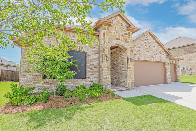 4125 Stockman Dr, Krum, TX 76249 - french country inspired facade with an attached garage, concrete driveway, and brick siding