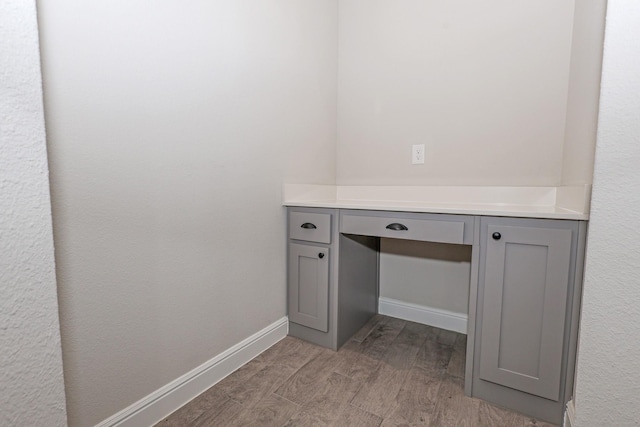 4125 Stockman Dr, Krum, TX 76249 - bathroom featuring wood finished floors, baseboards, and vanity