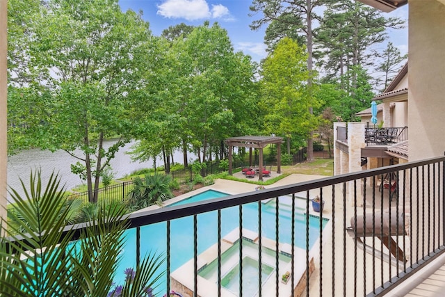 view of pool featuring a pergola and a pool with connected hot tub