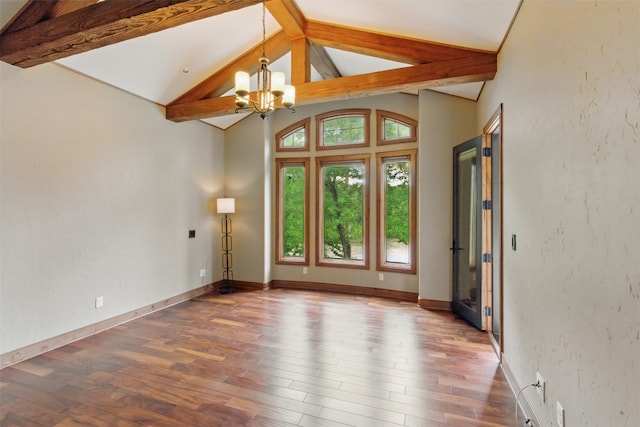 unfurnished room with an inviting chandelier, beam ceiling, wood finished floors, baseboards, and high vaulted ceiling