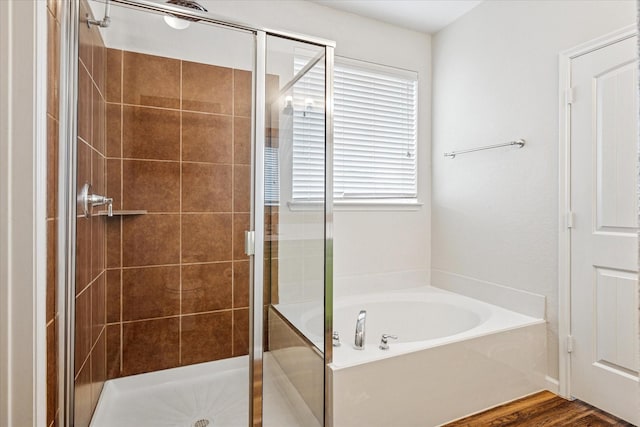 5208 Hidden Knolls Dr, Mckinney, TX 75071 - full bathroom featuring a shower stall, a bath, and wood finished floors