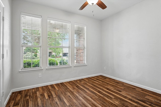 5208 Hidden Knolls Dr, Mckinney, TX 75071 - spare room featuring dark wood-style floors, ceiling fan, and baseboards