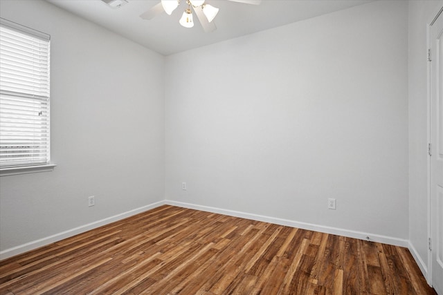 5208 Hidden Knolls Dr, Mckinney, TX 75071 - spare room with a ceiling fan, wood finished floors, and baseboards