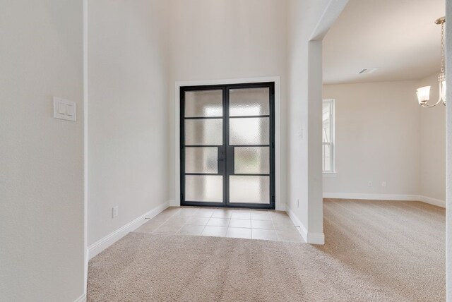 1006 Cascading Creek Dr, Rockwall, TX 75087 - spare room with light colored carpet, light tile patterned flooring, and baseboards