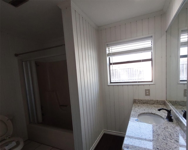 bathroom with vanity and visible vents
