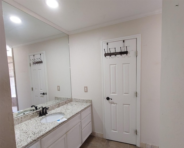 bathroom featuring tile patterned floors, vanity, recessed lighting, and crown molding