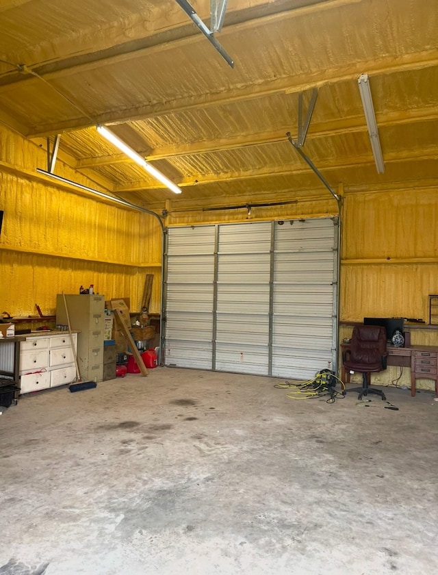 garage with wood walls