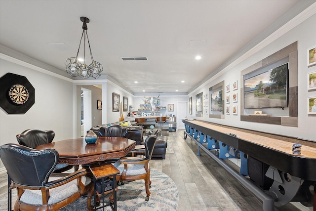 7909 Bal Harbour Ct, Fort Worth, TX 76179 - dining space with light wood finished floors, recessed lighting, and crown molding