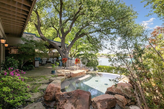 7909 Bal Harbour Ct, Fort Worth, TX 76179 - view of yard featuring a patio area and a water view