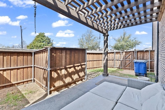 view of patio / terrace featuring a pergola and a fenced backyard