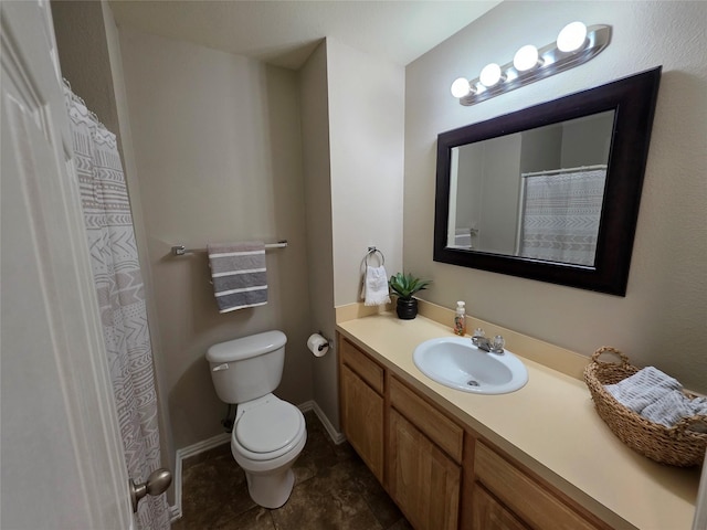 full bathroom with toilet and vanity