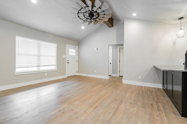 unfurnished living room featuring high vaulted ceiling, baseboards, light wood-style floors, and recessed lighting